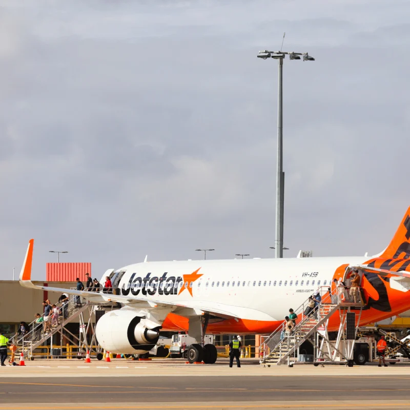 Jetstar Plane on Runway at Airport