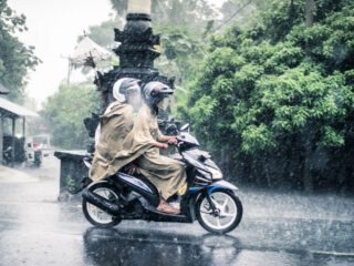 Two People on Moped in Rain in Bali.jpg