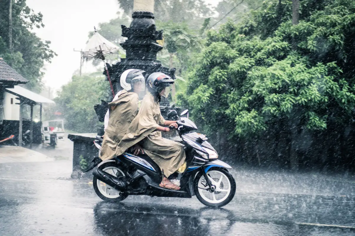 Two People on Moped in Rain in Bali.jpg
