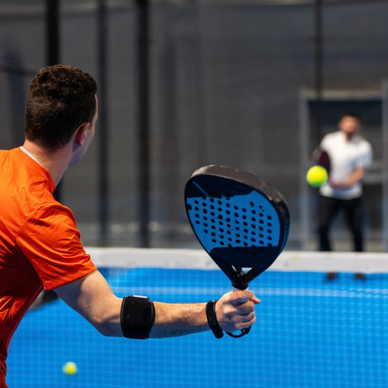 Two Men Play Padel