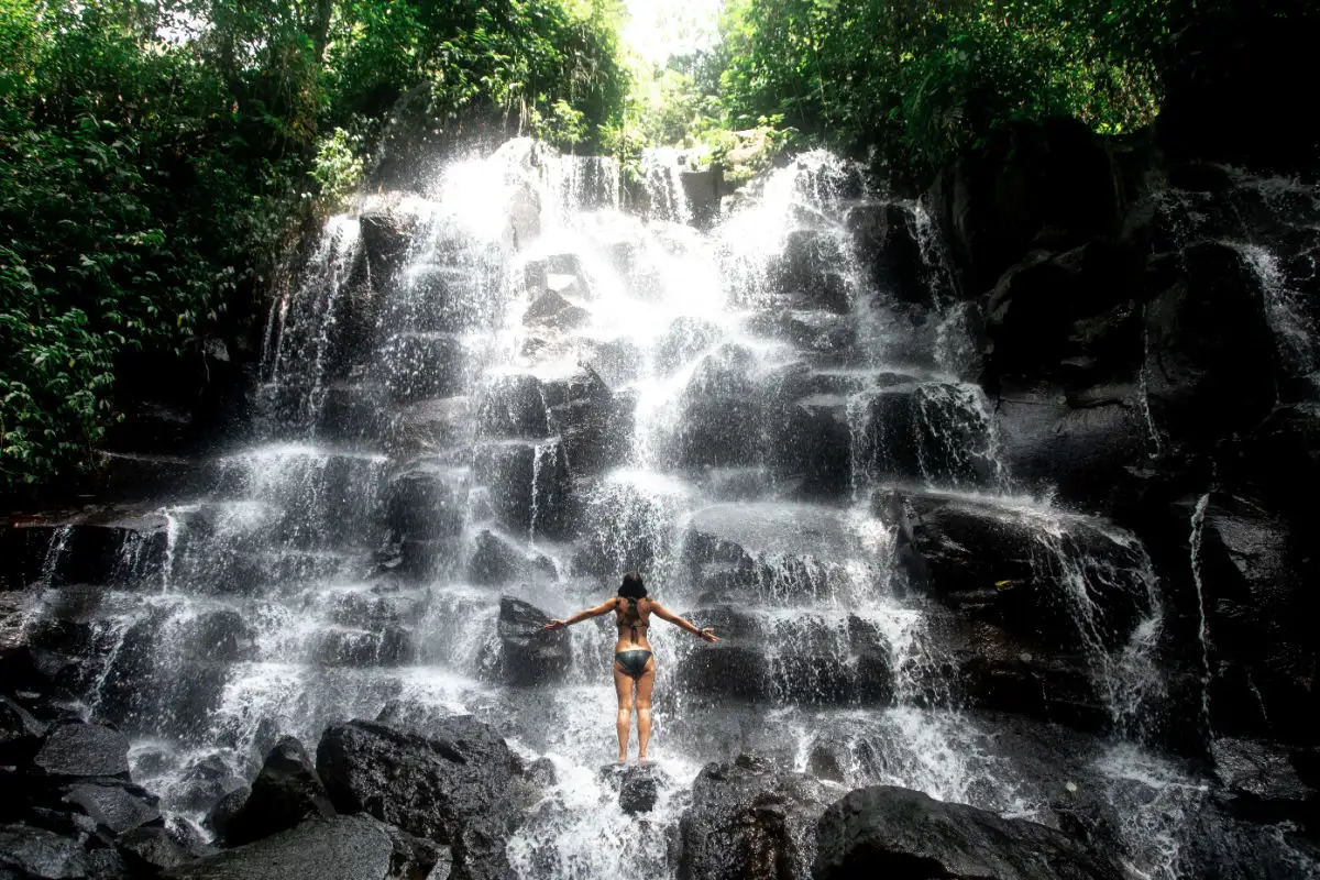 Tourist At Bali's Kanto Lampo Waterfall in Bangli Regency.jpg