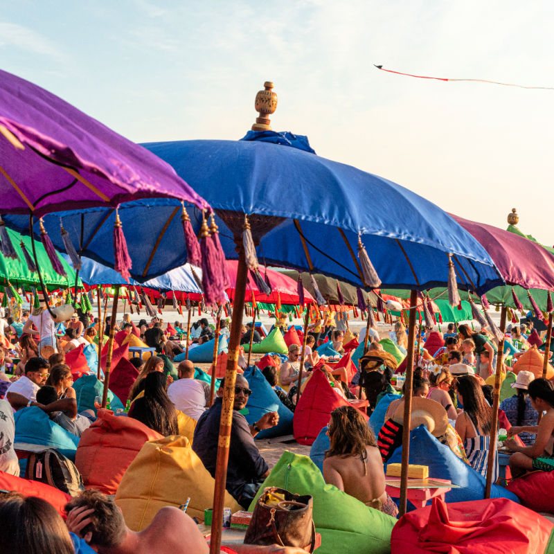 Busy Seminyak Beach with Tourists in Bali