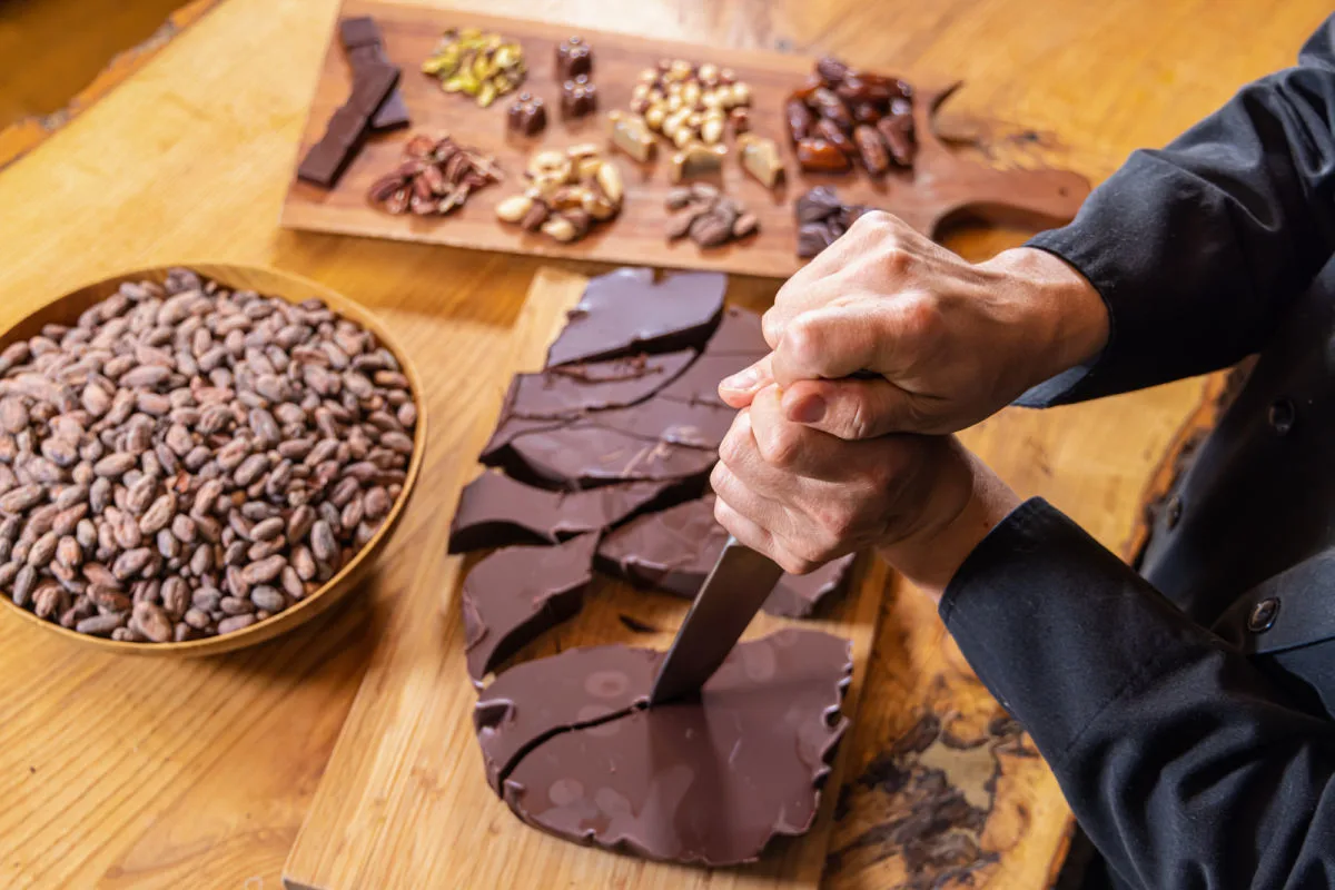 Chocolate maker works with cacao.jpg