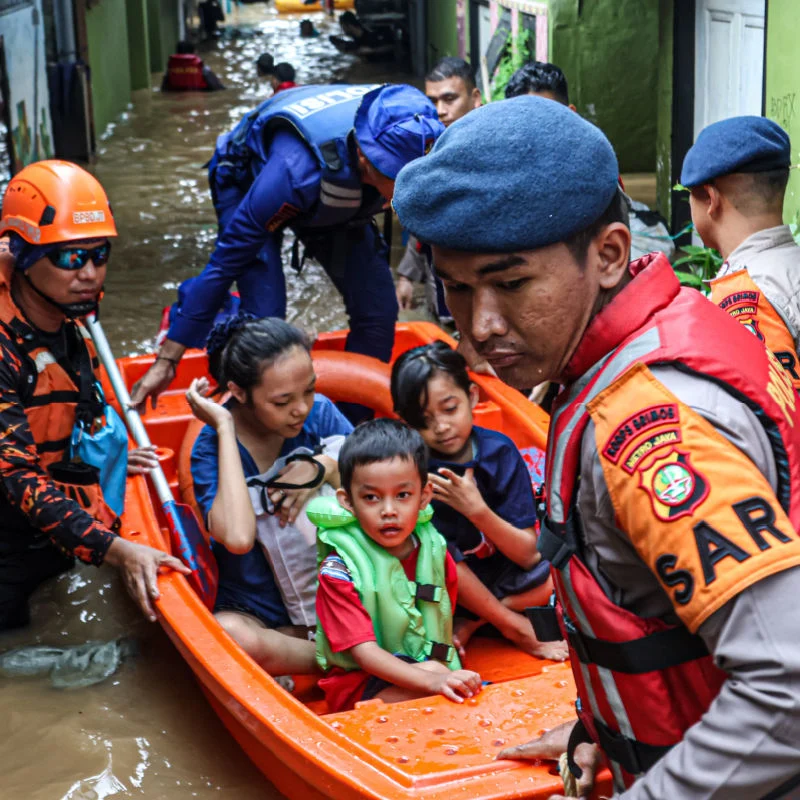 Flooding In Indonesia Causes Search And Resuce Officers To Evacuate Local People.jpg