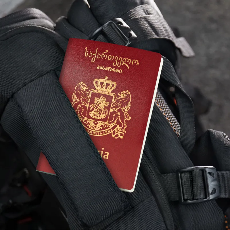 Georgian Passport On Backpack