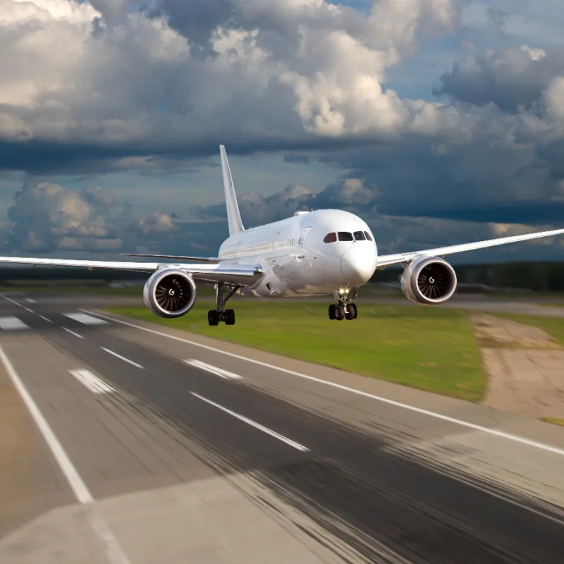 Plane Takes Off From Airport Runway