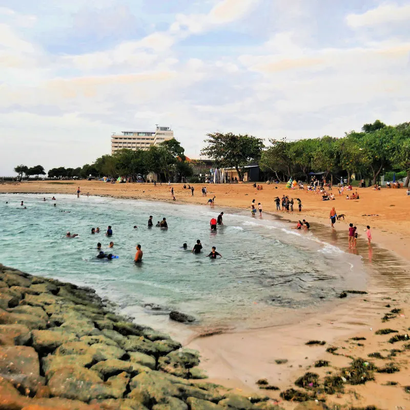 View of Tourists on Sanur Beach in Bali