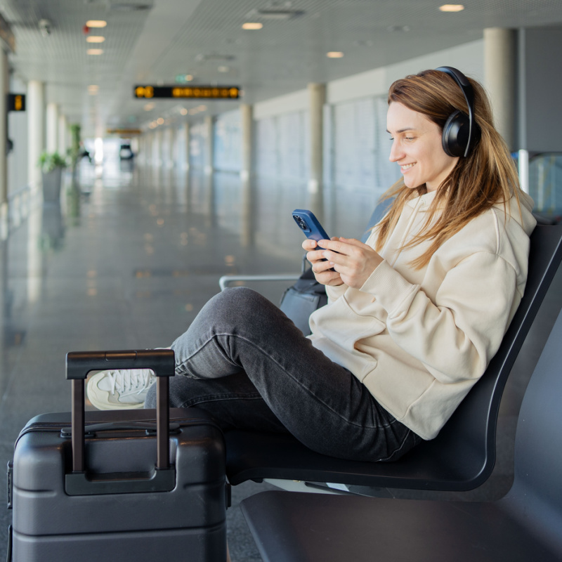 Woman on Phone At Airport