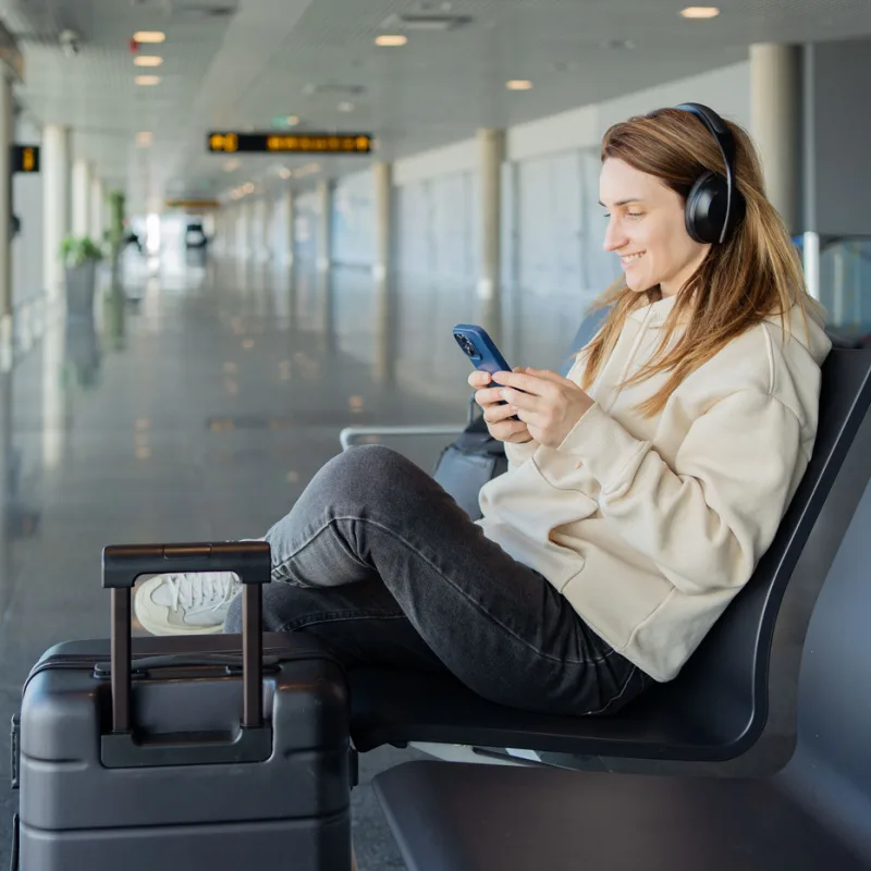 Woman on Phone At Airport