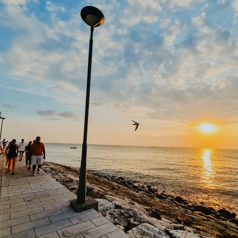 Kuta Beach Sidewalk At Sunset in Bali