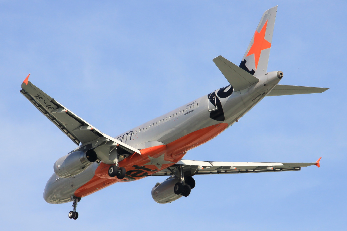 Jetstar Plane in Sky.jpg
