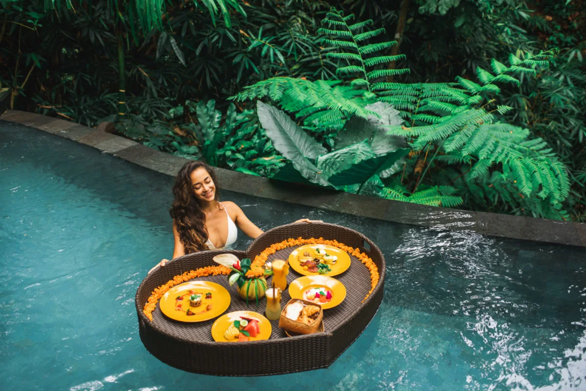 Women Having Bali Floating Breakfast in Luxury Hotel Pool.jpg