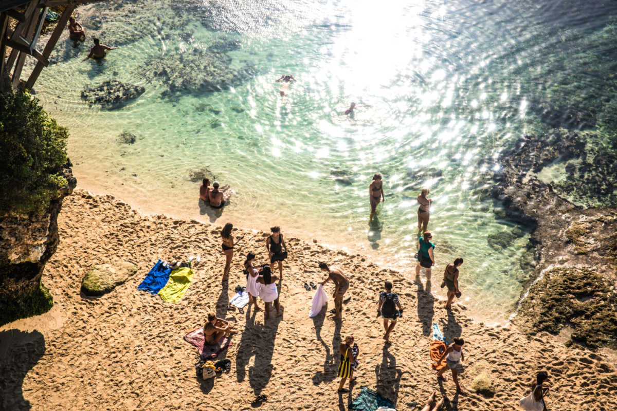 View of Surfers on Bali Uluwatu Beach.jpg