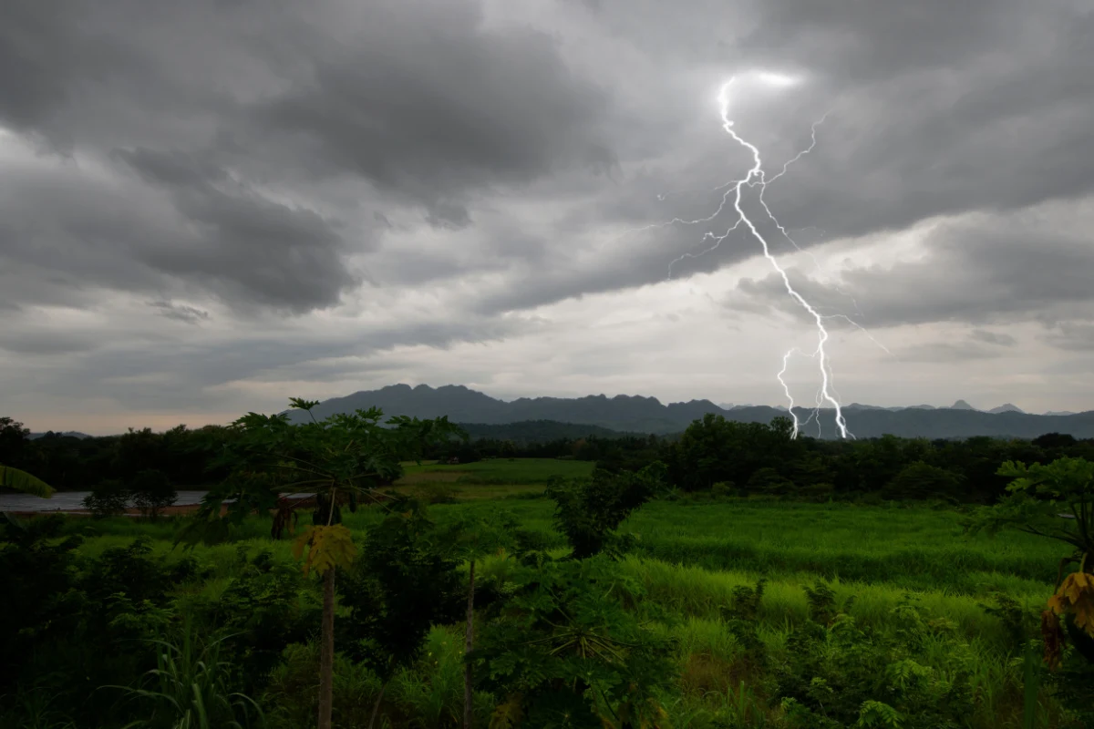 Lightening Strikes Over Farming Landscape. Weather Storm Rain