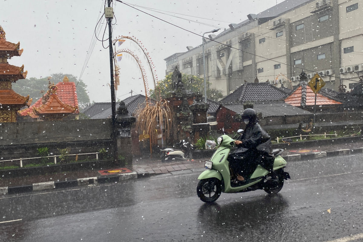 Driver in the Rain in Bali.jpg
