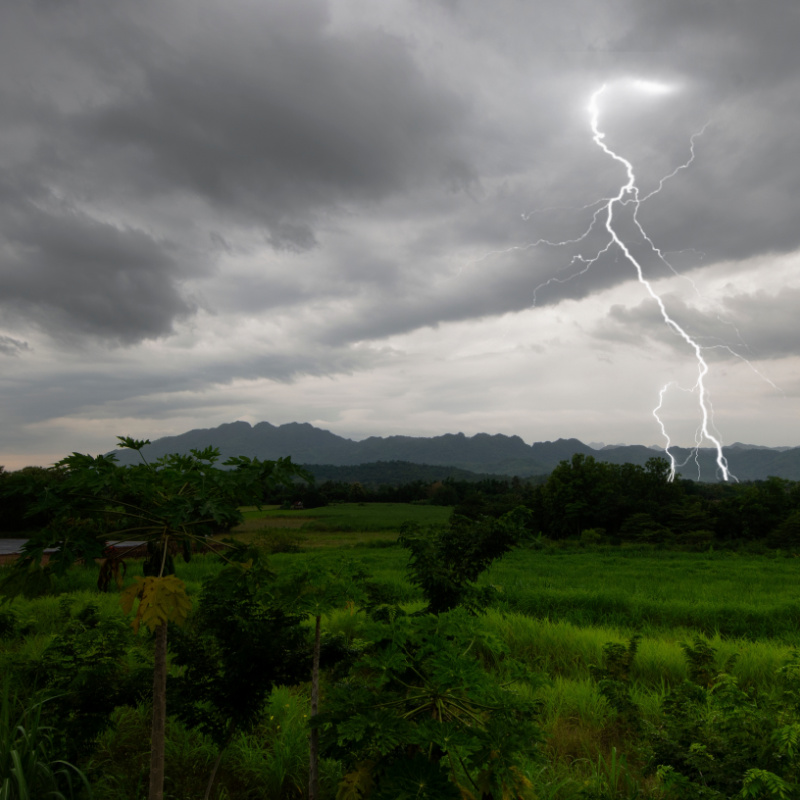 Lightening Strikes Over Farming Landscape