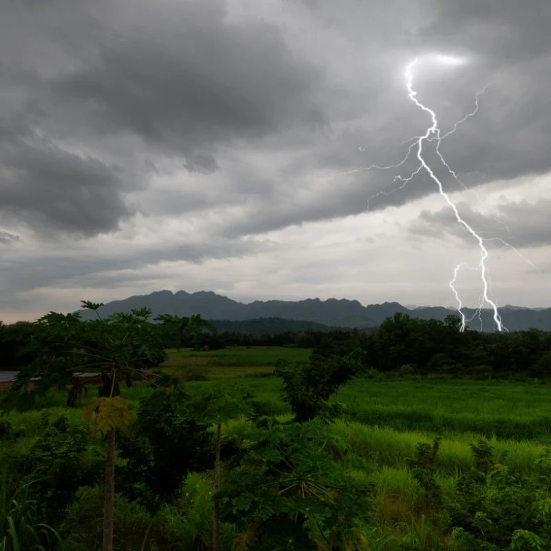 Lightening Strikes Over Farming Landscape