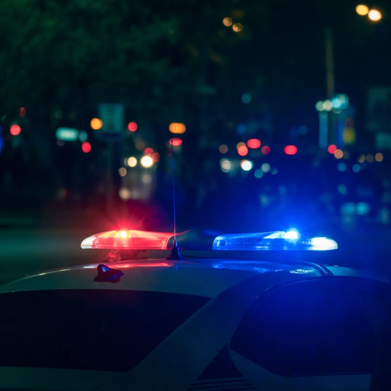 Police Car Lights at Night in Bali