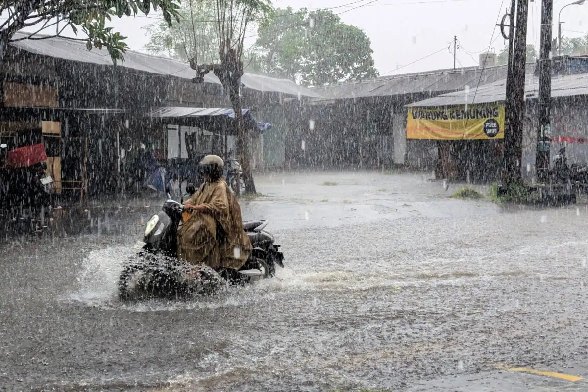 Driver on Moped in Rain in Bali