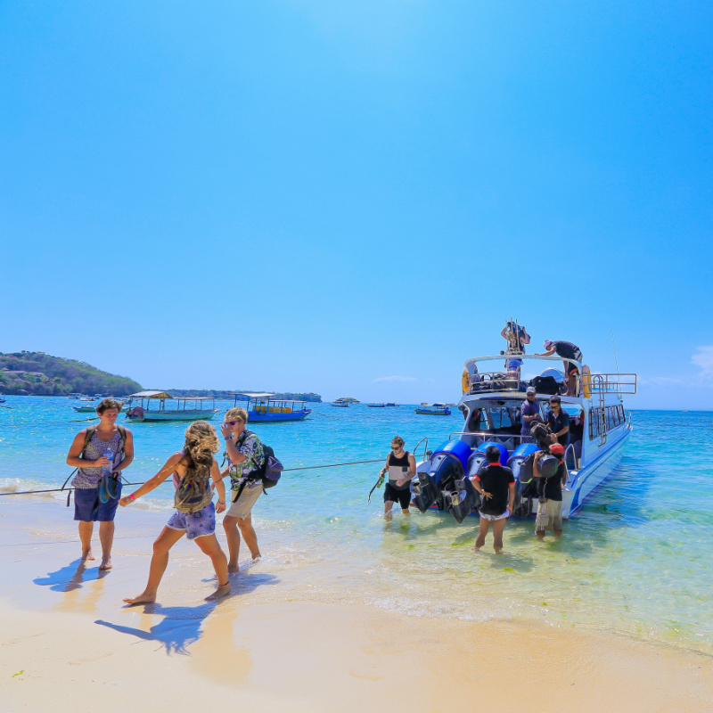 Tourists Get Off Fast Boat in Bali