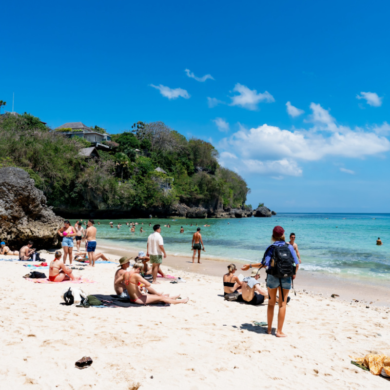 View of Tourists in Uluwatu Beach in Bali.jpg