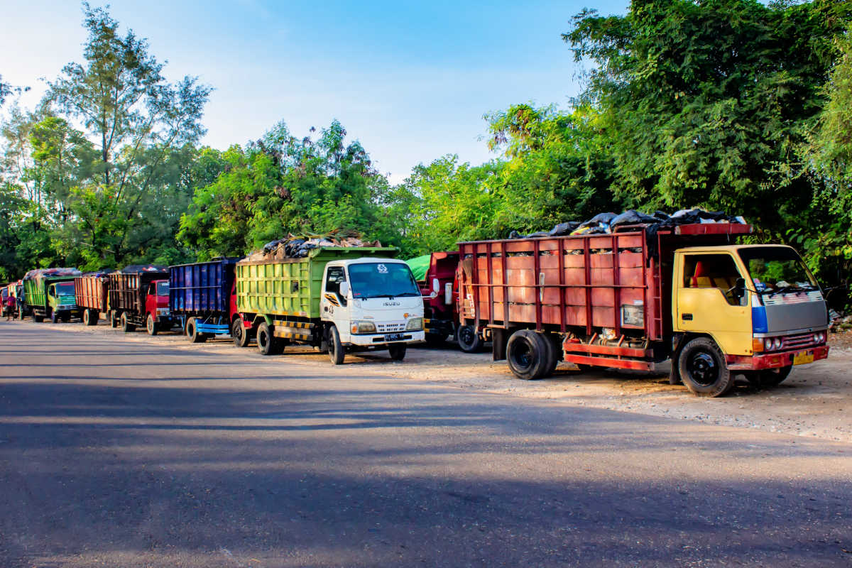Garbage Trucks Queue for Suwung TPA Trash Mountain in Bali.jpg
