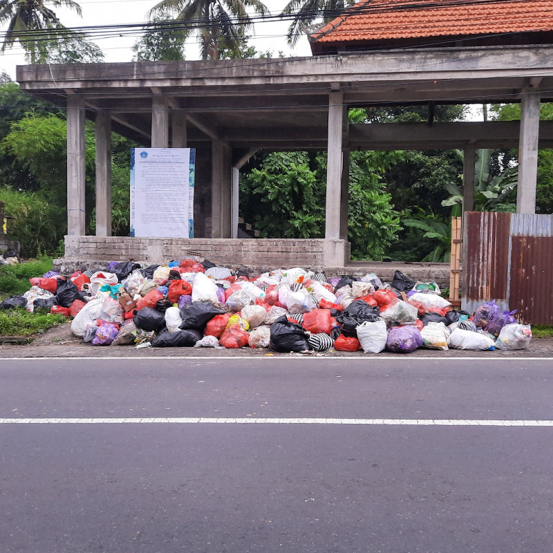 Trash Bags Pile Up In Street in Bali