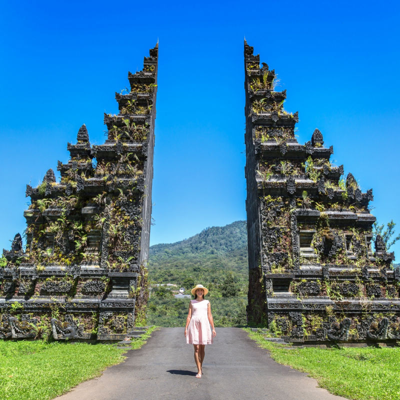 View of Woman Tourist In Handara Gate in Bali