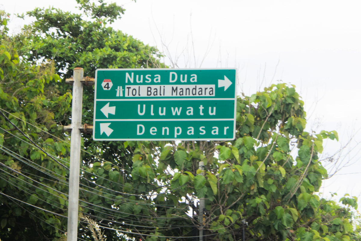 Road Sign for Nusa Dua Uluwatu Denpasar in Bali.jpg