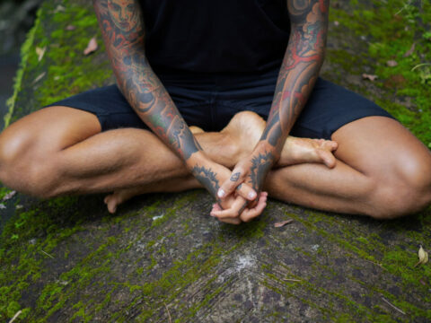 View of Man Cross Legged with Tattoos in Bali Meditation.jpg