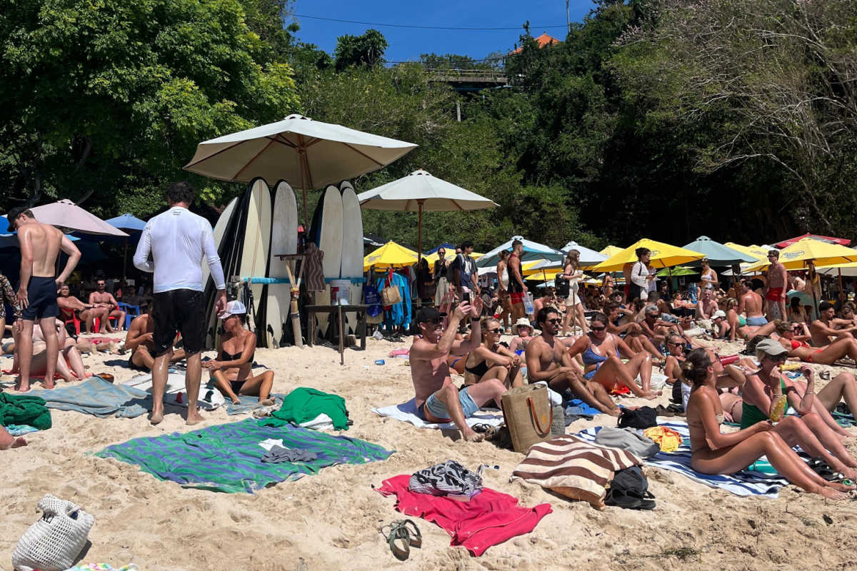 Tourist on Padang Padang Beach in Uluwatu Bali.jpg