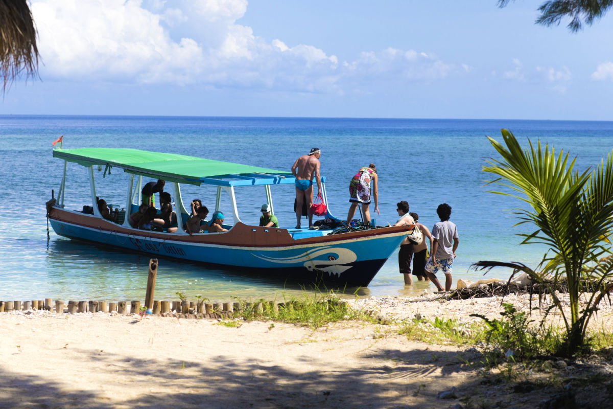 View of Tourists Getting Off Boat on Bali Island.jpg