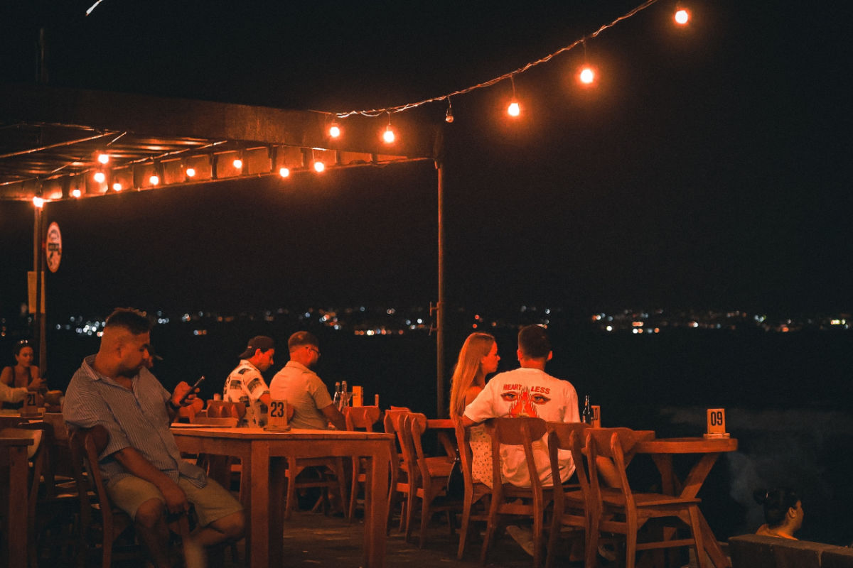 Couple Has Dinner at Restaurant In Bali at Night.jpg