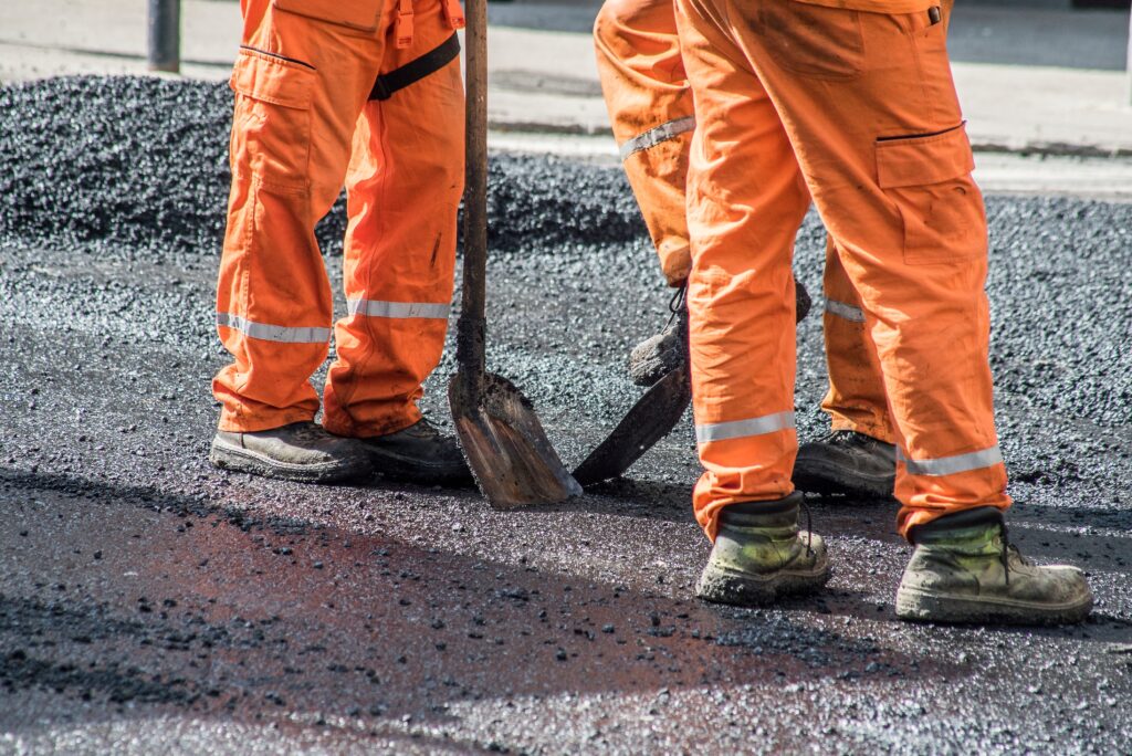 Traffic Workers Build Road in Bali