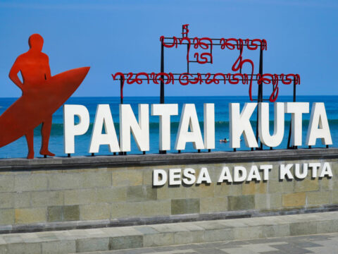 View of Kuta Beach Sign